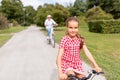 Grandmother and granddaughter cycling at park Royalty Free Stock Photo