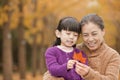 Grandmother and granddaughter in park Royalty Free Stock Photo