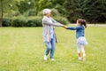 Grandmother and granddaughter playing at park Royalty Free Stock Photo