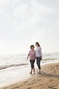 Grandmother and Granddaughter Taking a Walk by the Beach Royalty Free Stock Photo