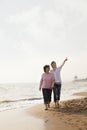Grandmother and Granddaughter Taking a Walk by the Beach Royalty Free Stock Photo