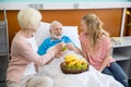 Grandmother and granddaughter visiting patient Royalty Free Stock Photo