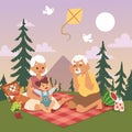 Grandmother and grandfather together play with their happy young granddaughter at a summer picnic outdoor nature near Royalty Free Stock Photo