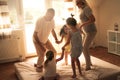 Grandmother and grandfather together with their granddaughters