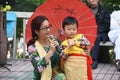 A grandmother and grandson perform on the same stage Royalty Free Stock Photo