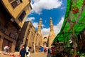 Grandmother and grandson walk down the street in the heart of Cairo in Egypt Royalty Free Stock Photo