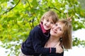 Grandmother and grandson on a walk in a park Royalty Free Stock Photo