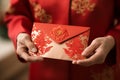 Grandmother hands holding red packet, giving red envelope as a money gift celebrating Chinese new year. Generative AI Royalty Free Stock Photo