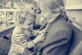 Grandmother having her grandaughter in lap and talking. Royalty Free Stock Photo