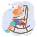 Grandmother with her granddaughter sits on a wooden retro rocking chair. Smiling elderly woman and granddaughter.