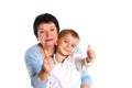 Grandmother hugging her grandson on a white background, showing signs Royalty Free Stock Photo