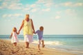 Grandmother with kids- little boy and girl- at beach Royalty Free Stock Photo