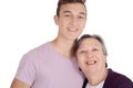 Grandmother kissing her teen grandson Royalty Free Stock Photo