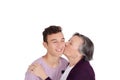 Grandmother kissing her teen grandson Royalty Free Stock Photo