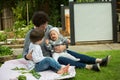 Grandmother laughing with grandchildren outside Royalty Free Stock Photo