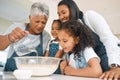 Grandmother, mom or children in kitchen to bake as a happy family with siblings learning cookies recipe. Mixing cake Royalty Free Stock Photo