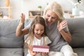 Grandmother present excited little granddaughter birthday gift