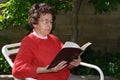 Grandmother Reads Bible Royalty Free Stock Photo