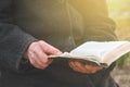 Grandmother reads the holy scripture bible. Thinking of God. Power of religion, worship, belief. Royalty Free Stock Photo