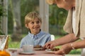 Grandmother serving homemade cake