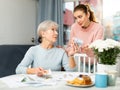 Grandmother giving money to granddaughter Royalty Free Stock Photo