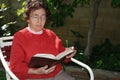 Grandmother Studies Bible in G Royalty Free Stock Photo