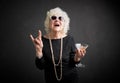 Grandmother with sunglasses and drink in hand Royalty Free Stock Photo
