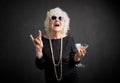 Grandmother with sunglasses and drink in hand