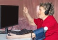 Grandmothers in the modern world of high technology. Grandmothers love computer games