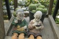 Grandpa and grandma doll garden decorations in a coffee shop