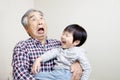 Smiling grandpa and grandson