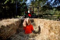 Grandpa taking granddaughter on a hayride Royalty Free Stock Photo