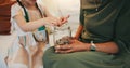 Grandparent, child and hands with money jar for savings, coins or investment together on living room sofa at home Royalty Free Stock Photo