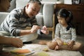 Grandparent playing with niece at home Royalty Free Stock Photo