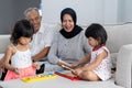 Grandparent with their granddaughters playing together Royalty Free Stock Photo