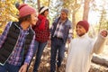 Grandparents With Children Walking Through Fall Woodland Royalty Free Stock Photo