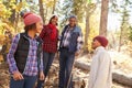 Grandparents With Children Walking Through Fall Woodland Royalty Free Stock Photo