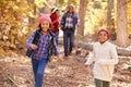 Grandparents With Children Walking Through Fall Woodland Royalty Free Stock Photo