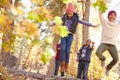 Grandparents With Children Walking Through Fall Woodland Royalty Free Stock Photo