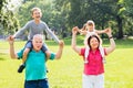 Grandparents Giving Grandchildren Piggyback Ride Royalty Free Stock Photo