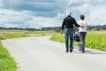 Grandparents Going For A Walk With Granchild Royalty Free Stock Photo