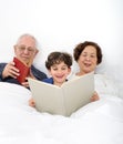 Grandparents grandchild bed Royalty Free Stock Photo