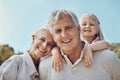 Grandparents, grandchild and portrait in a park for family, love and bonding in nature on blue sky background. Face Royalty Free Stock Photo