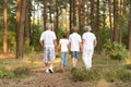 Grandparents and grandchildren in park