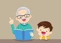 The grandfather reading book for the grandchildren on the table to enjoy. Royalty Free Stock Photo