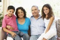 Grandparents With Grandchildren Relaxing At Home T Royalty Free Stock Photo