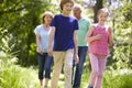 Grandparents With Grandchildren Walking Through Countryside Royalty Free Stock Photo