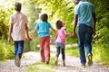 Grandparents With Grandchildren Walking Through Countryside Royalty Free Stock Photo