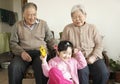 Grandparents with granddaughter Royalty Free Stock Photo