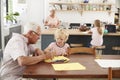 Grandparents and grandkids in family kitchen, close up Royalty Free Stock Photo